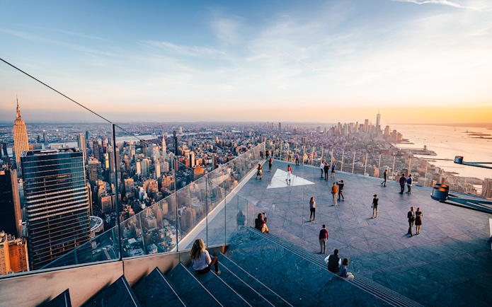 Visitors enjoying the view from the outdoor sky deck of Edge in New York City.