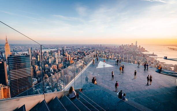 Visitors enjoying the view from the outdoor sky deck of Edge in New York City.