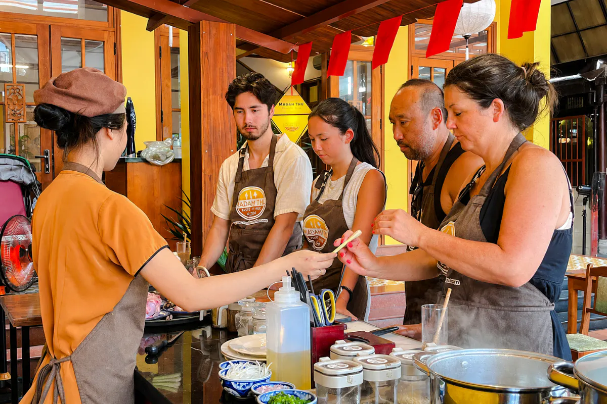 Hue Cooking Class: Cyclo Ride, Market Visit & Cooking with Meal