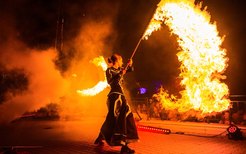 Fire performer at Sparty bath party in Budapest.