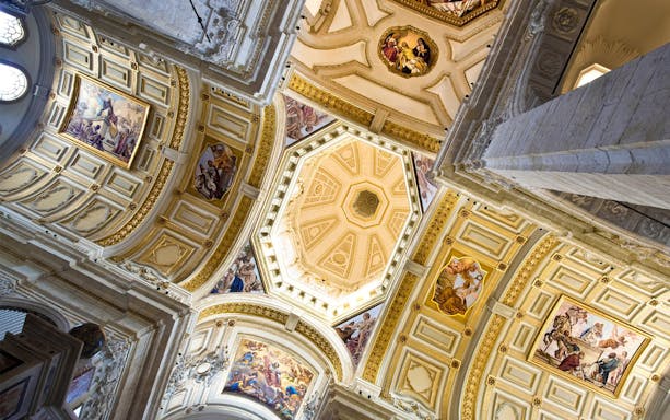 Ceiling frescoes and architectural details in an underground site in Cagliari.