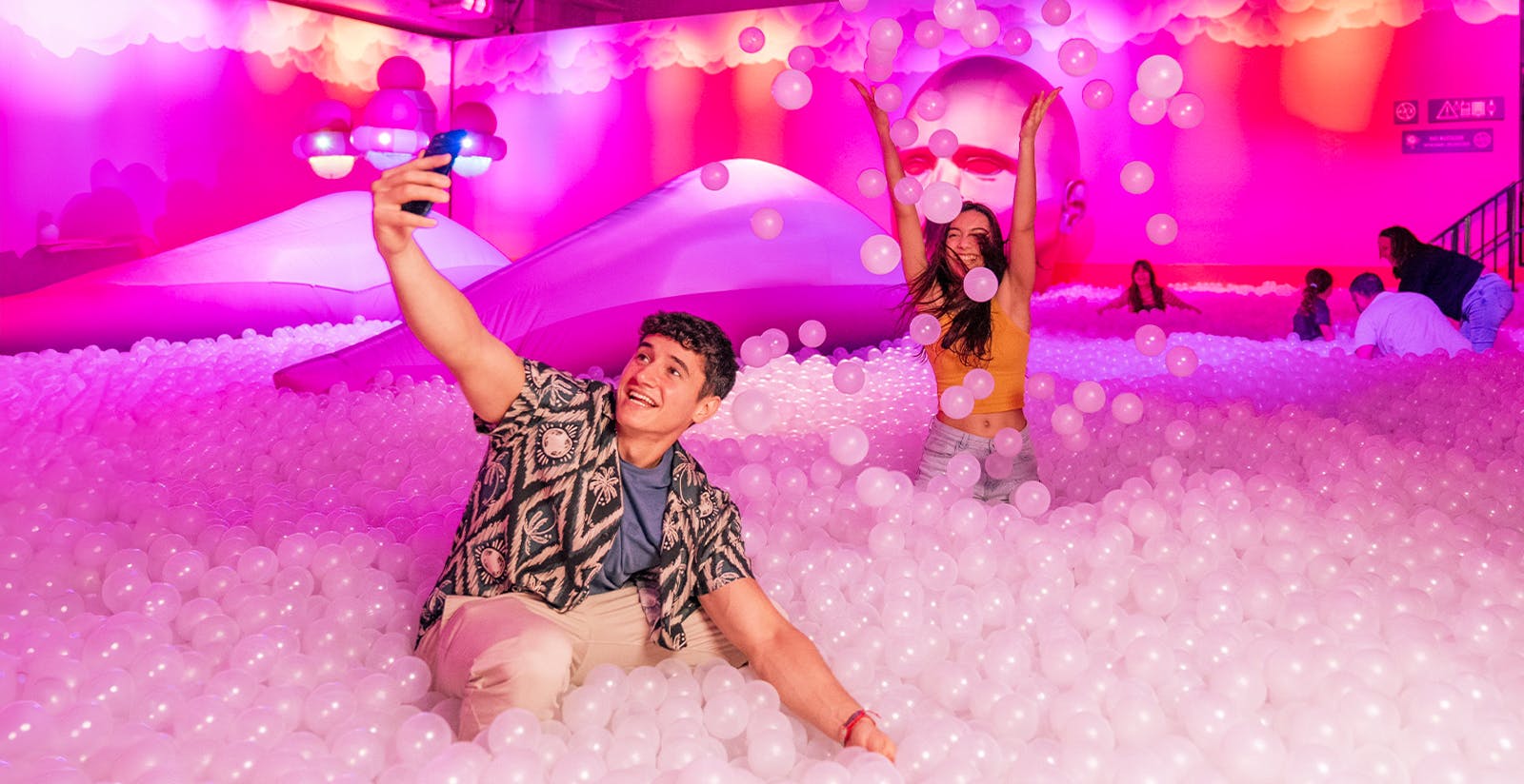 Immersive Bubble Planet exhibit with colorful spheres and interactive displays in London on Valentine's Day.