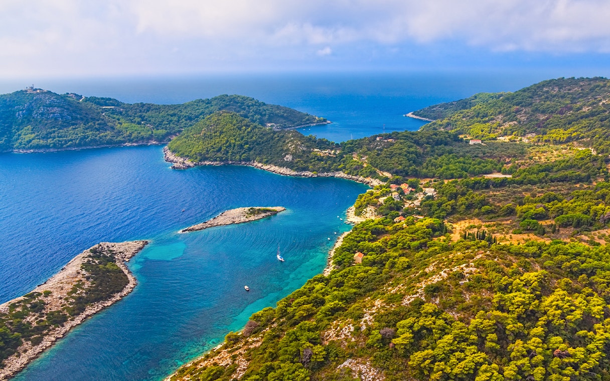 Aerial view of Elaphiti Archipelago's lush islands and turquoise waters near Dubrovnik.