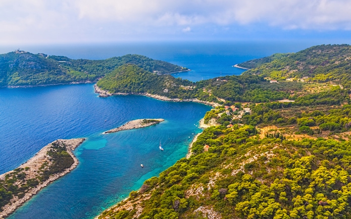 Aerial view of Elaphiti Archipelago's lush islands and turquoise waters near Dubrovnik.