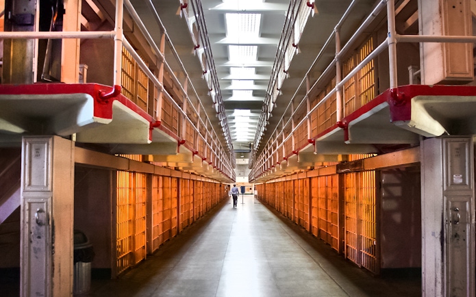 Alcatraz Prison cell block interior during San Francisco Bay cruise tour.