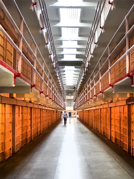 Alcatraz Prison cell block interior during San Francisco Bay cruise tour.