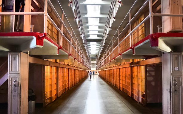 Alcatraz Prison cell block interior during San Francisco Bay cruise tour.