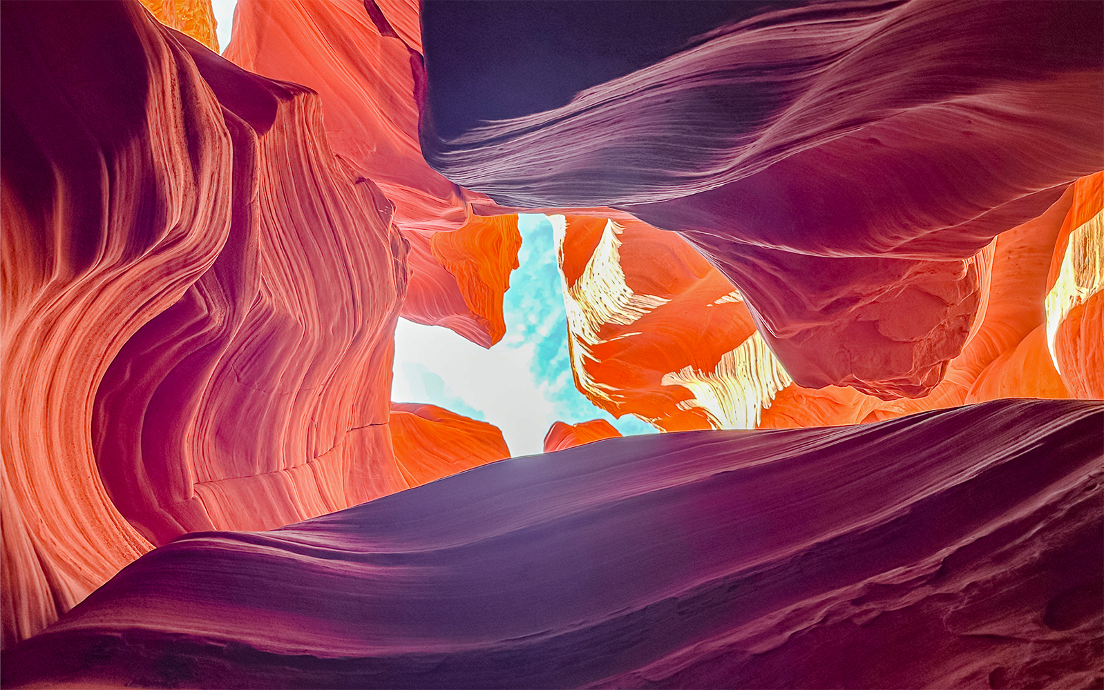 Antelope Canyon X rock formations with sunlight filtering through, Arizona.