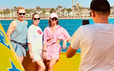 People posing for a photo on Royal Seascope Submarine, Hurghada.