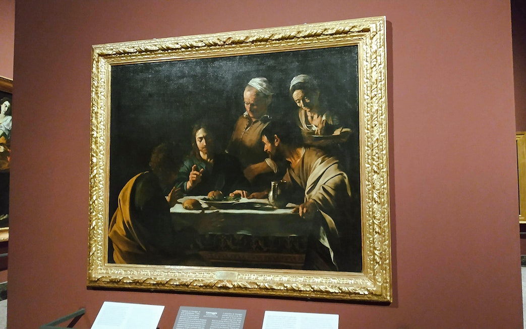 Caravaggio's "The Supper at Emmaus" painting displayed at Pinacoteca di Brera, Milan.