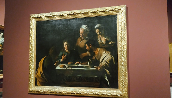 Caravaggio's "The Supper at Emmaus" painting displayed at Pinacoteca di Brera, Milan.