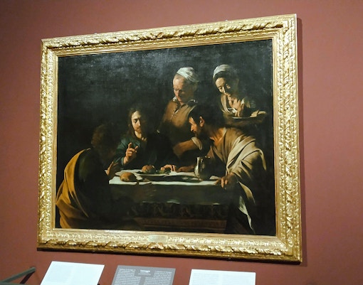 Caravaggio's "The Supper at Emmaus" painting displayed at Pinacoteca di Brera, Milan.