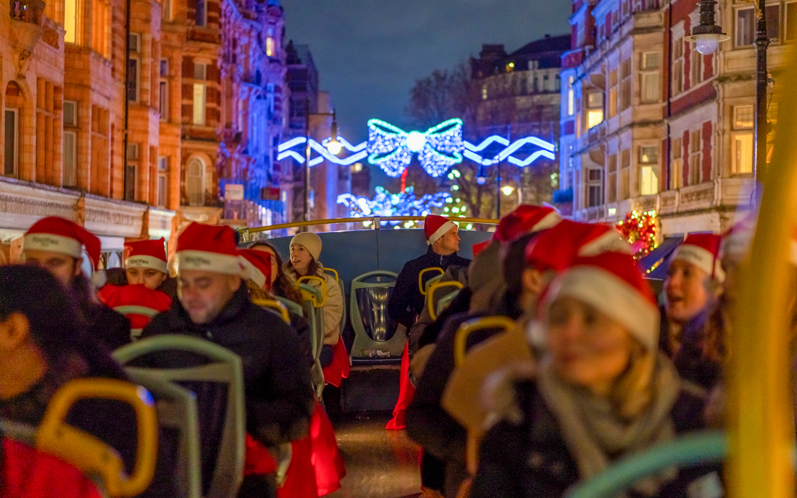 Double-decker bus tour of London Christmas lights on Regent Street.