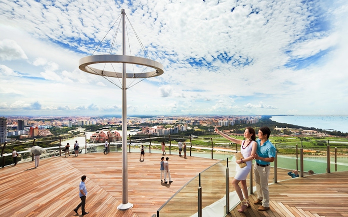 Visitors enjoying the view from Marina Bay Sands SkyPark Observation Deck, Singapore.