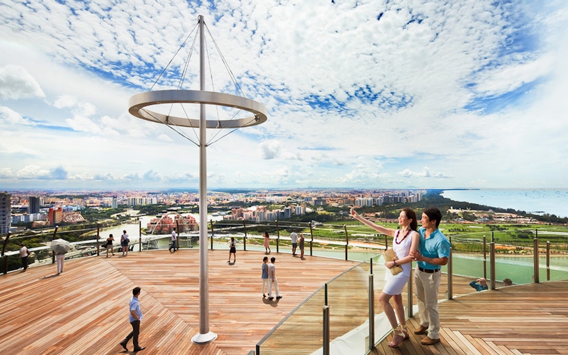 Visitors enjoying the view from Marina Bay Sands SkyPark Observation Deck, Singapore.