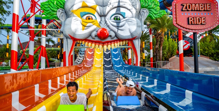 Water slide at Zombieland, Columbia Pictures Aquaverse Pattaya, with riders enjoying the thrill.
