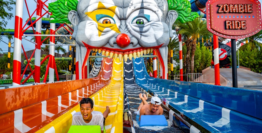 Water slide at Zombieland, Columbia Pictures Aquaverse Pattaya, with riders enjoying the thrill.