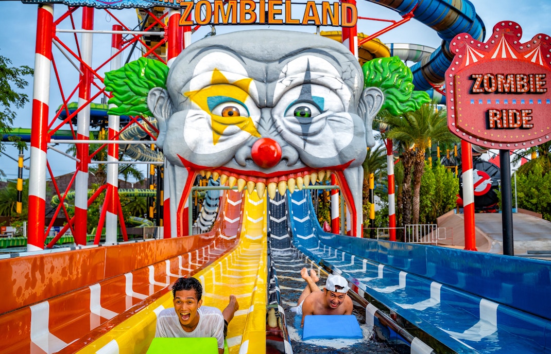 Water slide at Zombieland, Columbia Pictures Aquaverse Pattaya, with riders enjoying the thrill.