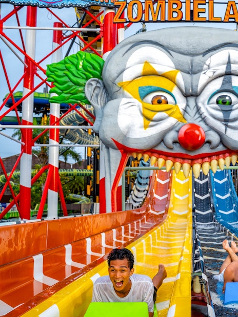 Water slide at Zombieland, Columbia Pictures Aquaverse Pattaya, with riders enjoying the thrill.