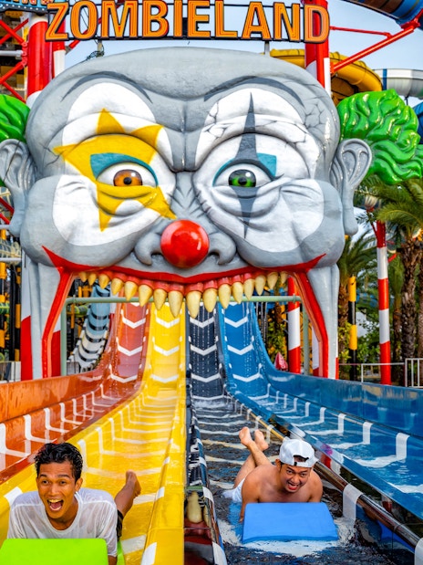 Water slide at Zombieland, Columbia Pictures Aquaverse Pattaya, with riders enjoying the thrill.