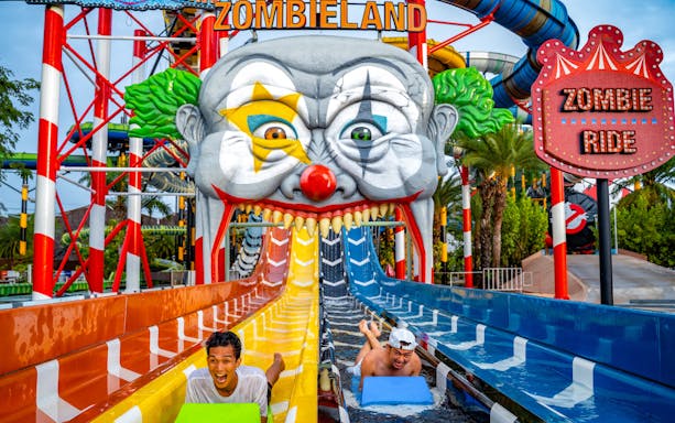 Water slide at Zombieland, Columbia Pictures Aquaverse Pattaya, with riders enjoying the thrill.
