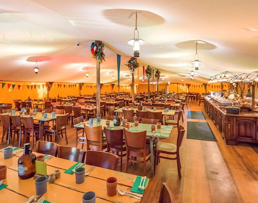 Festively decorated dining hall at Hobbiton Movie Set for a Hobbiton festive lunch tour from Auckland.
