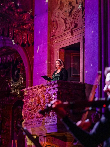Performers at light show inside Clérigos Church, Porto.