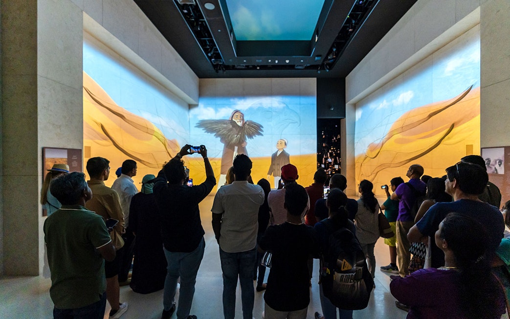 Tourists viewing digital art exhibit at Expo City Dubai.