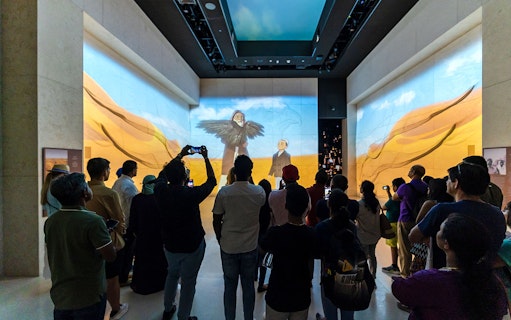 Tourists viewing digital art exhibit at Expo City Dubai.