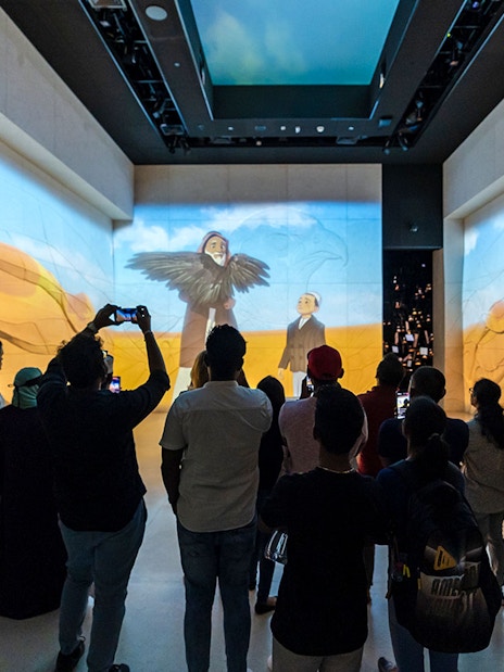 Tourists viewing digital art exhibit at Expo City Dubai.