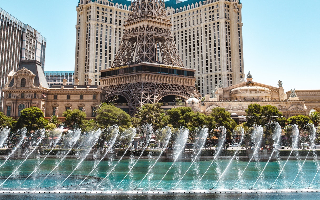 Eiffel Tower replica with fountain display in Las Vegas.