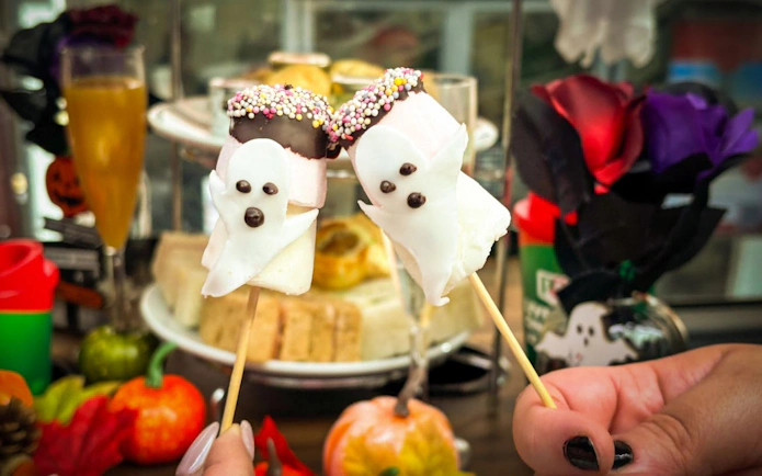 Ghost-shaped marshmallow treats on London Halloween Afternoon Tea Bus Tour.