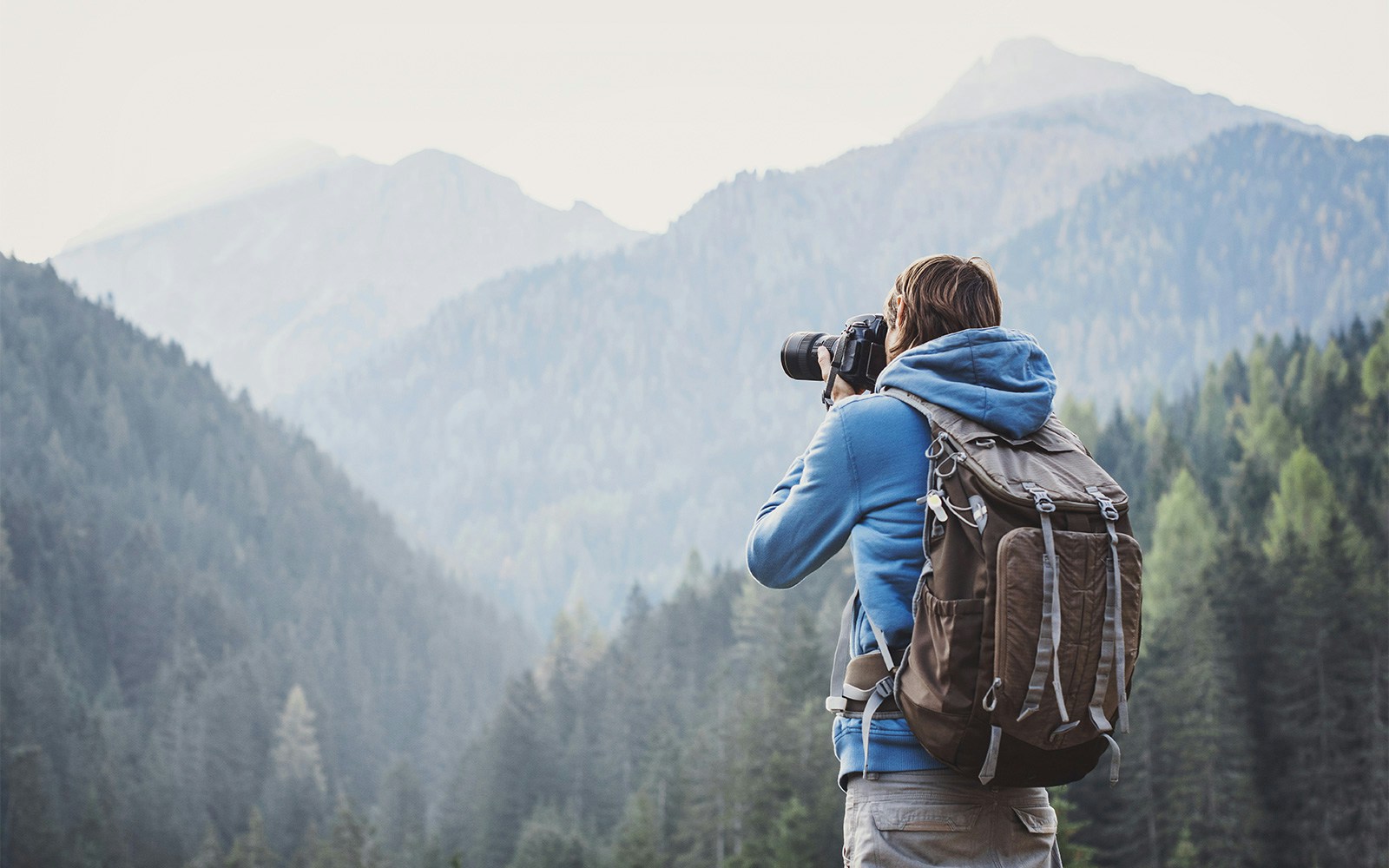 Man taking nature's photograph