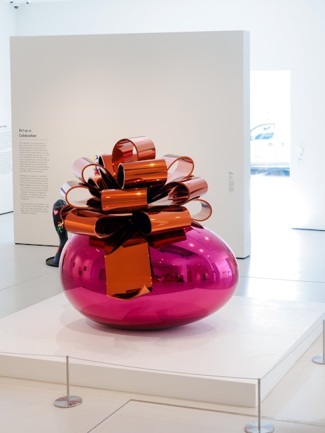 Moco Museum London interior with large pink sculpture and modern art displays.