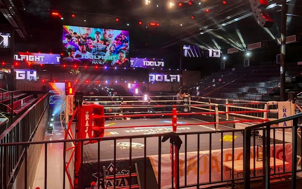 Boxing ring with lights at World Siam Stadium in Bangkok.