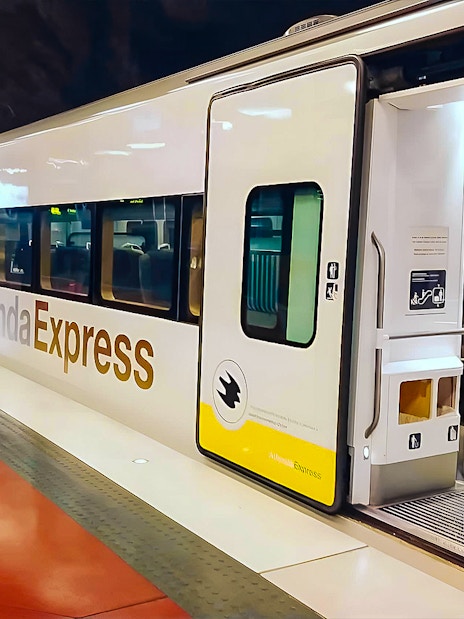Stockholm Arlanda Express train at underground station platform.