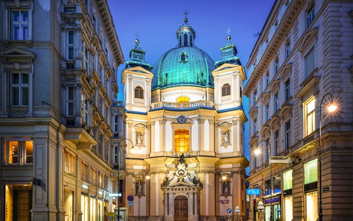 St. Peter's Church in Vienna illuminated at night, venue for Christmas and New Year's concert.