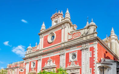 Church of El Salvador facade in Seville with ornate architectural details.