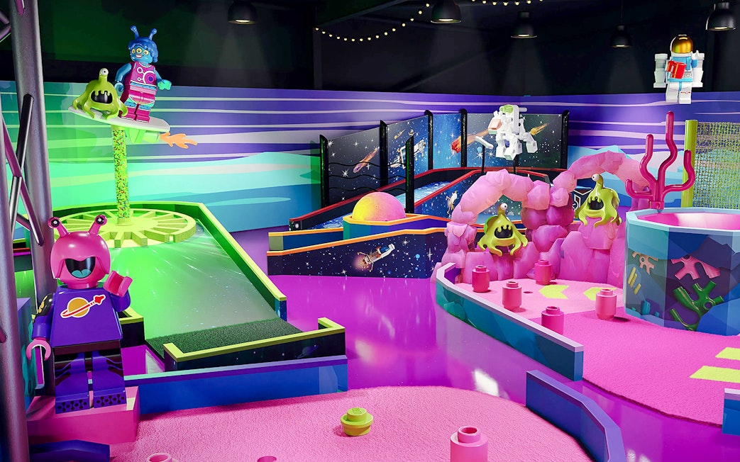 LEGOLAND® space-themed mini golf course with alien and astronaut figures.