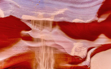 Antelope Canyon X sandstone formations with light beams in Arizona.