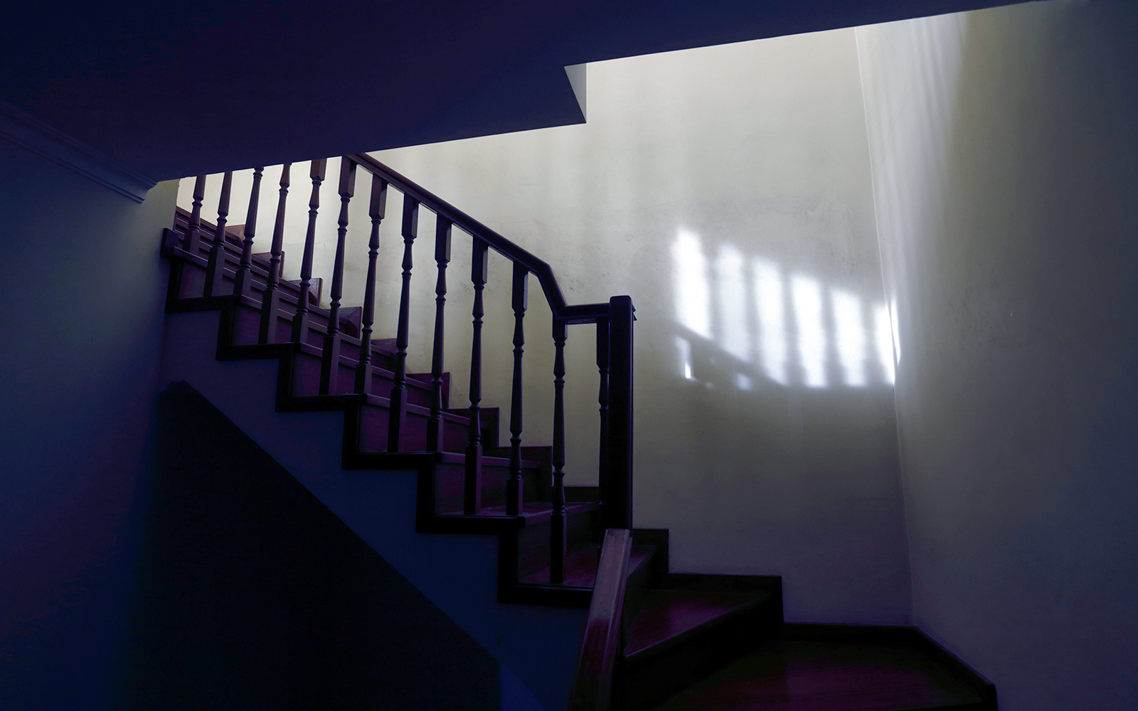 Staircase in a haunted place with dark corridors