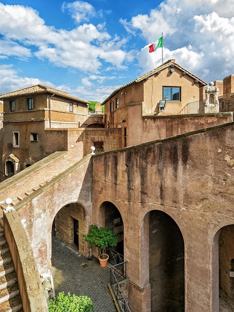 Castel Sant'Angelo courtyard with Italian flag, Rome, Italy.