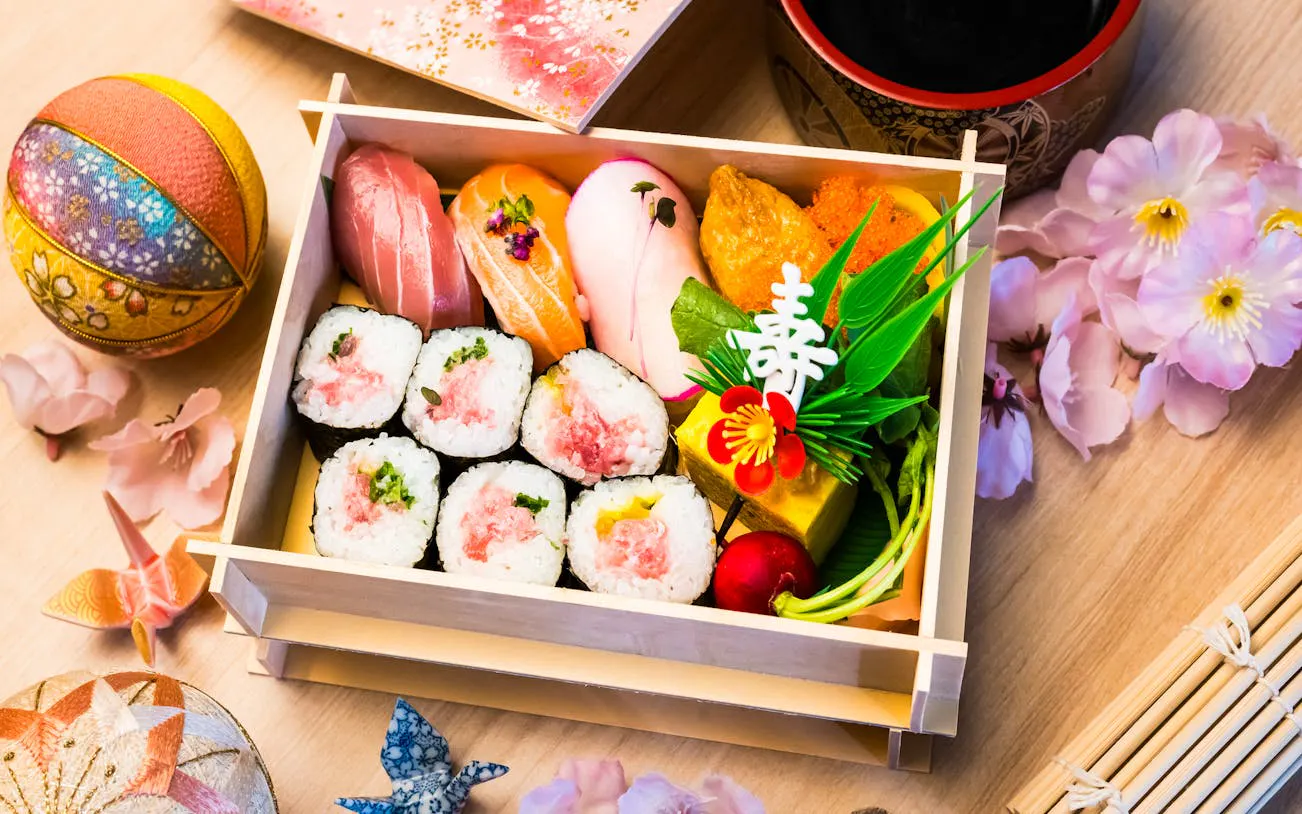 Sushi bento box with assorted nigiri and rolls, part of Tsukiji Market tour with tuna tasting.