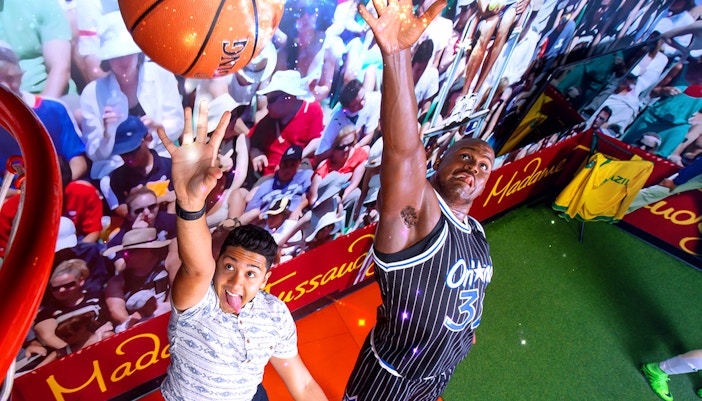 Shaquille O'Neal wax figure at Madame Tussauds Orlando sports exhibit.