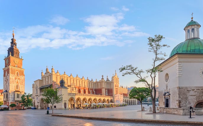 Krakow Old Town with Cloth Hall and Town Hall Tower during guided walking tour.