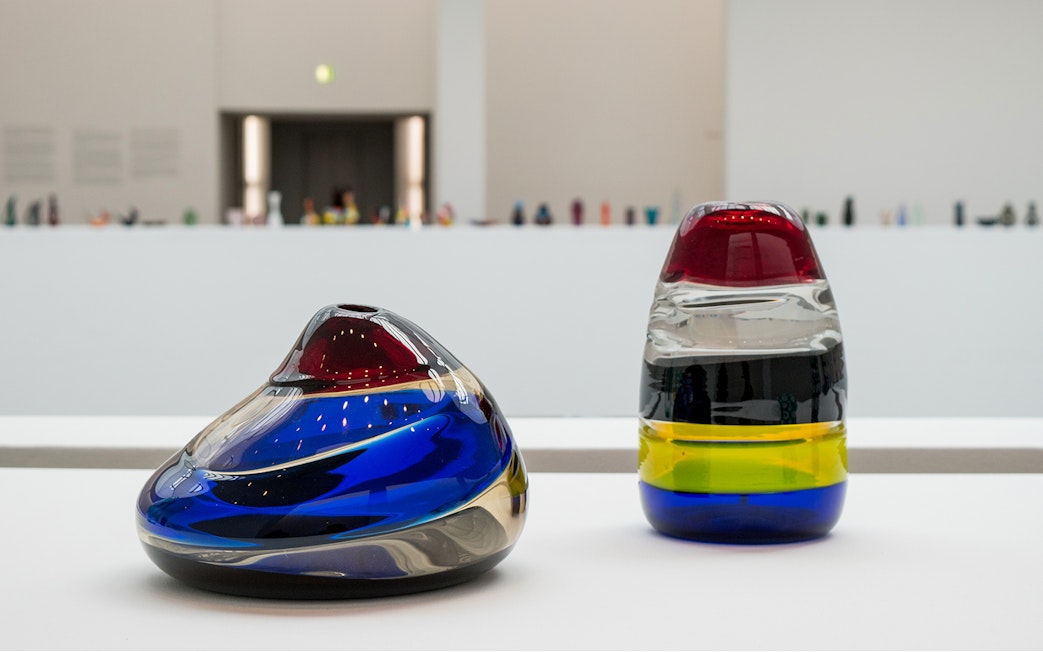 Colorful glass sculptures in a Venice museum exhibit.