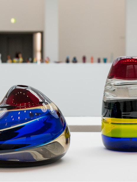 Colorful glass sculptures in a Venice museum exhibit.