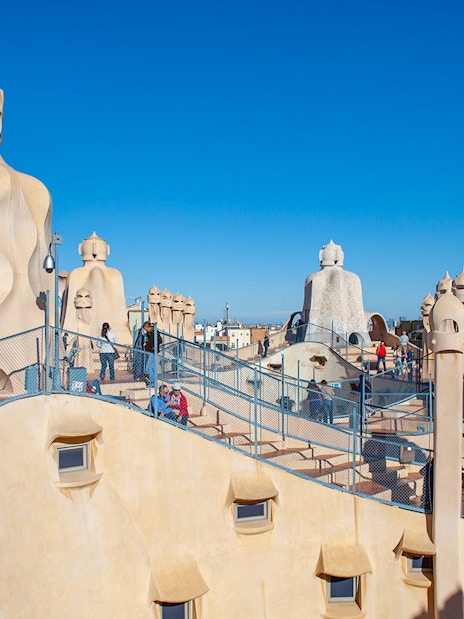 Tourists on Casa Milà rooftop in Barcelona with Turbopass City Card.