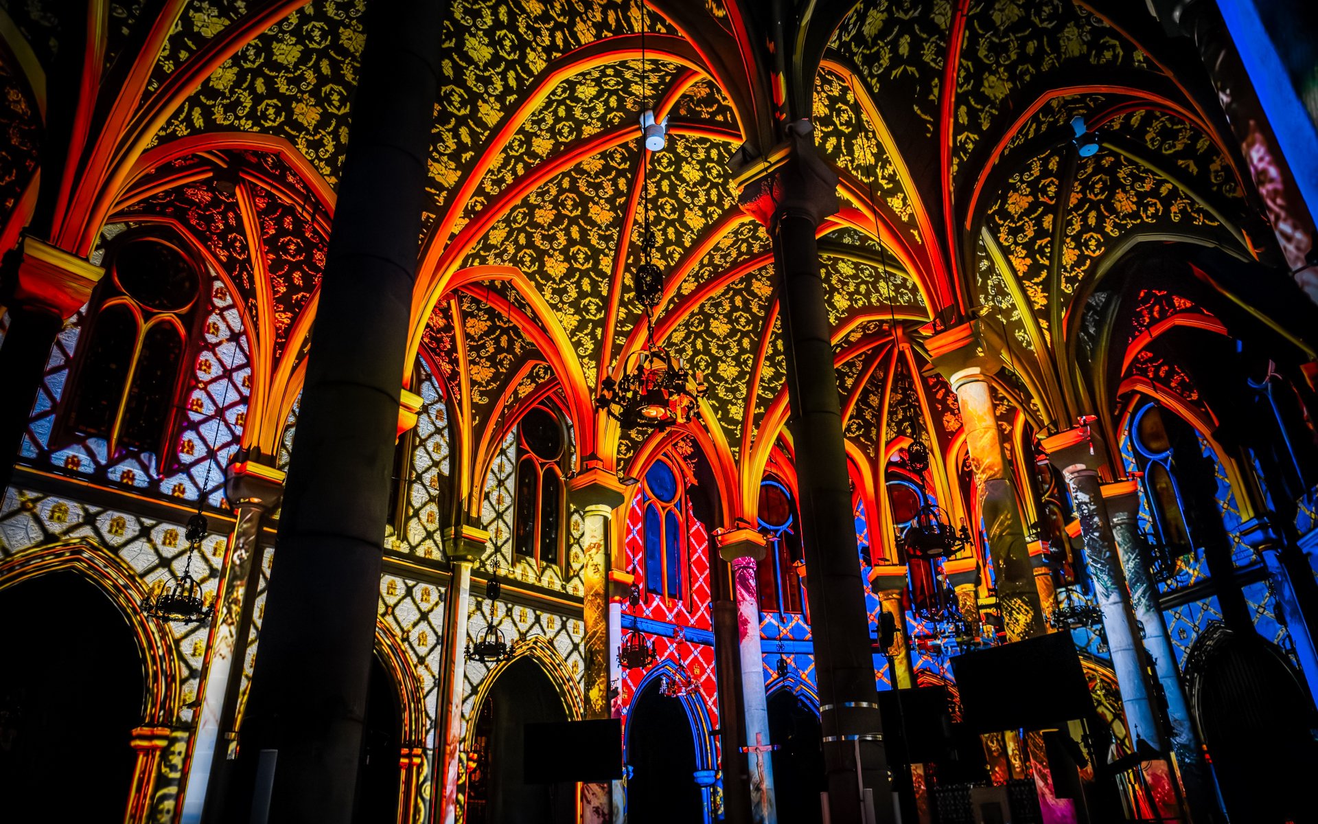 Interiors of Manchester Cathedral illuminated during LUMINISCENCE Manchester 360° Immersive Show.