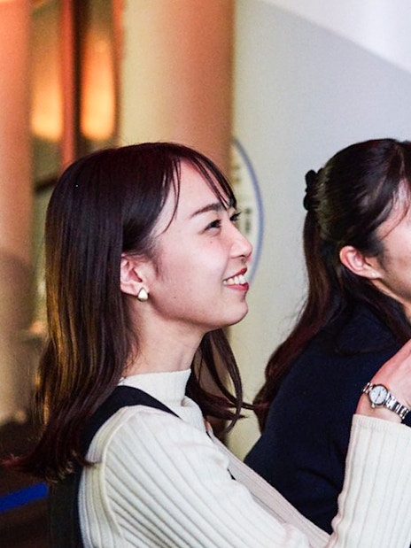 Tourists enjoying Tokyo night skyline from Tembo Deck.